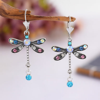 Eleganti orecchini con draghi intagliati