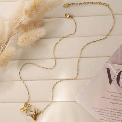 Collana con abbraccio dal cuore dorato