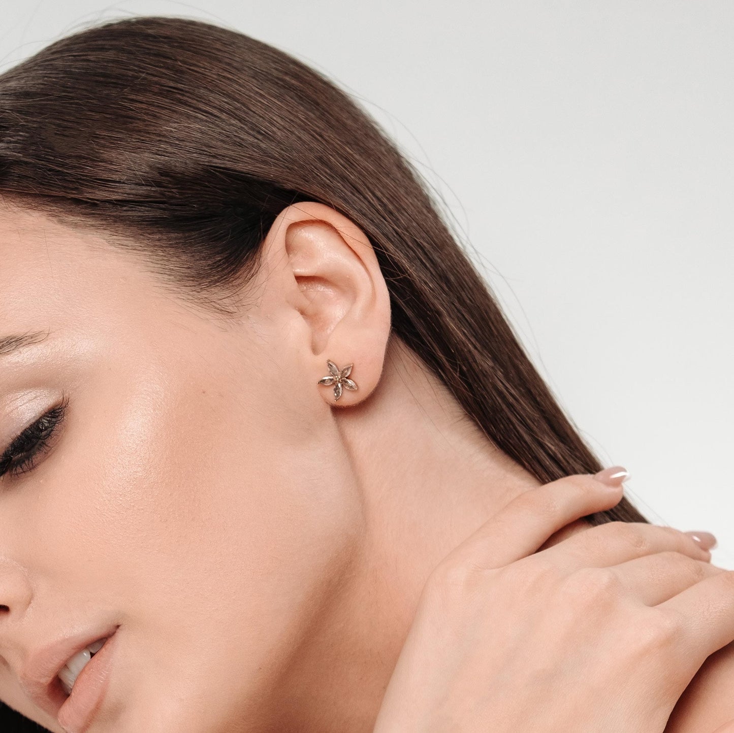 Delicati orecchini a bottone con rosette