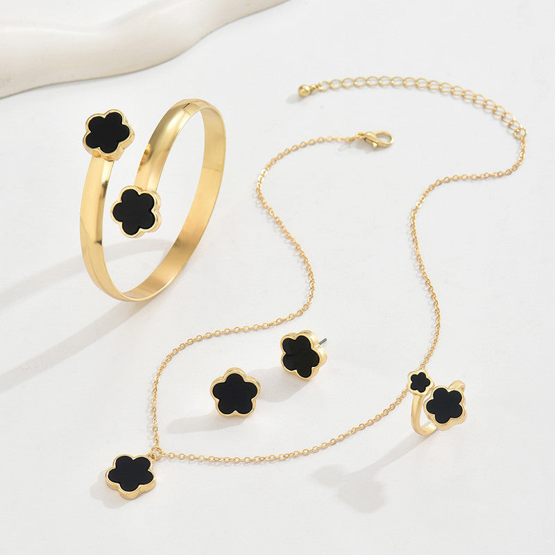 Elegante set di gioielli 4 pezzi con ciondoli neri e dorati